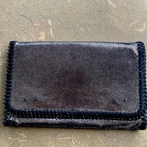 Silver and black clutch